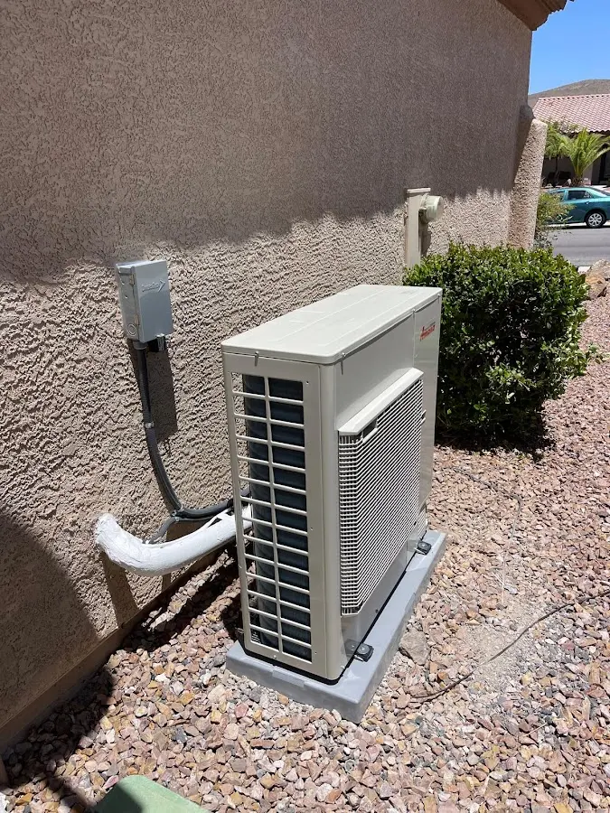 Residential air conditioning condenser unit in Clinton